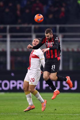 Strahinja Pavlovic (Ac Milan) und Lorenzo Colombo (Genoa Cfc) battle for the ball, Serie A, AC Milan v Genoa CFC, Giuseppe Meazza, January 8, 2026, Milan, Italy.