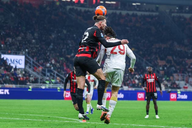 CALCIO - Serie A - AC Milan vs Genoa CFC Adrien Rabiot of AC Milan competes for the ball with Lorenzo Colombo of Genoa CFC during Serie A 2025 26 football match between AC Milan and Genoa CFC at San Siro Stadium in Milan Milan Italy  Copyright: xIPAxSport ABACAx