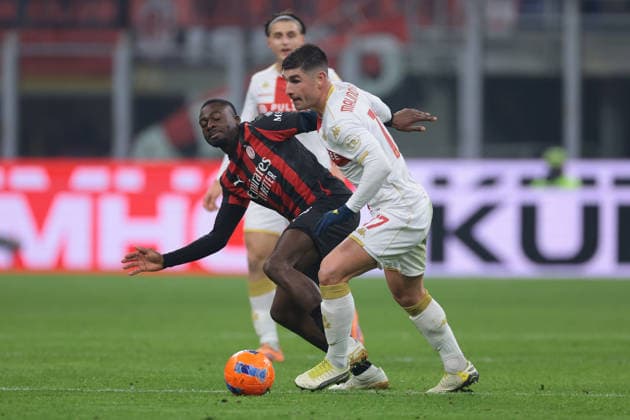 Milan, Italy, 8th January 2026. Ruslan Malinovskyi of Genoa CFC dispossesses Youssouf Fofana of AC Milan during the AC Milan vs Genoa Serie A match at Giuseppe Meazza, Milan. Picture credit should read: Jonathan Moscrop Sportimage EDITORIAL USE ONLY. No use with unauthorised audio, video, data, fixture lists, club league logos or live services. Online in-match use limited to 120 images, no video emulation. No use in betting, games or single club league player publications. SPI_036_JM_MILAN_GENOA_ SPI-4409-0036