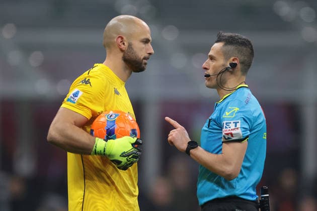 Milan, Italy, 8th January 2026. The Referee Maurizio Mariani discusses with Nicola Leali of Genoa CFC regarding time wasting during the AC Milan vs Genoa Serie A match at Giuseppe Meazza, Milan. Picture credit should read: Jonathan Moscrop Sportimage EDITORIAL USE ONLY. No use with unauthorised audio, video, data, fixture lists, club league logos or live services. Online in-match use limited to 120 images, no video emulation. No use in betting, games or single club league player publications. SPI_044_JM_MILAN_GENOA_ SPI-4409-0044