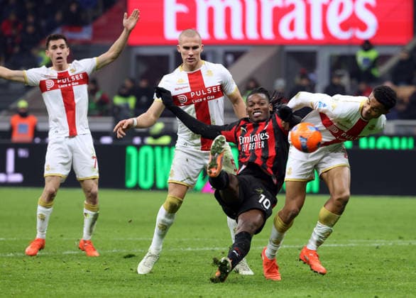 January 8, 2026, Milan, MILAN: Ac Milan s Rafael Leao (L) challenges for the ball with Genoa™s Alessandro Marcandalli during the Italian serie A soccer match between Milan and Genoa at Giuseppe Meazza stadium in Milan, 8 January 2026..ANSA MATTEO BAZZI. Soccer; Serie A: Milan Vs Genoa  - ZUMAa110 20260108_zaf_a110_030 Copyright: xMatteoxBazzix