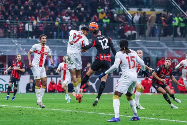 CALCIO - Serie A - AC Milan vs Genoa CFC Adrien Rabiot of AC Milan competes for the ball with Alessandro Marcandalli of Genoa CFC during Serie A 2025 26 football match between AC Milan and Genoa CFC at San Siro Stadium in Milan Milan Italy  Copyright: xIPAxSport ABACAx