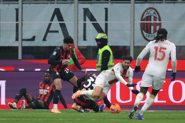 Milan, Italy, 8th January 2026. Mikael Egill Ellertsson of Genoa CFC is fouled by Davide Bartesaghi of AC Milan to earn a late penalty over the crossbar during the AC Milan vs Genoa Serie A match at Giuseppe Meazza, Milan. Picture credit should read: Jonathan Moscrop Sportimage EDITORIAL USE ONLY. No use with unauthorised audio, video, data, fixture lists, club league logos or live services. Online in-match use limited to 120 images, no video emulation. No use in betting, games or single club league player publications. SPI_073_JM_MILAN_GENOA_ SPI-4409-0073