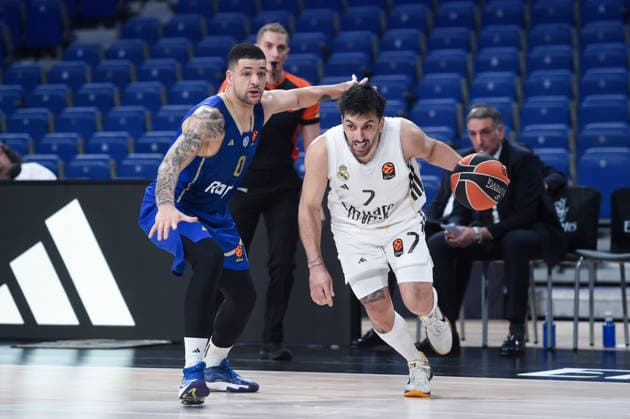(260109) -- MADRID, Jan. 9, 2026 -- Real Madrid s Facundo Campazzo (R) vies with Maccabi Rapyd Tel Aviv s Iffe Lundberg during the Euroleague basket game between Real Madrid and Maccabi Rapyd Tel Aviv, at Movistar Arena, in Madrid, Spain, on Jan. 8, 2026. (Photo by Xinhua) (SP)SPAIN-MADRID-BASKETBALL-EUROLEAGUE-REAL MADRID VS MACCABI RAPYD TEL AVIV GustavoxValiente 