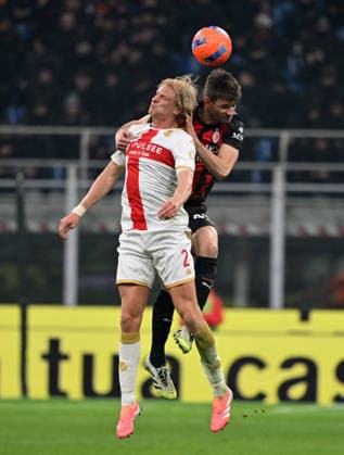 (260109) -- MILAN, Jan. 9, 2026 -- AC Milan s Matteo Gabbia (R) vies with Genoa s Morten Thorsby during a Serie A football match between AC Milan and Genoa in Milan, Italy, Jan.8, 2026. (Photo by Xinhua) (SP)ITALY-MILAN-FOOTBALL-SERIE A- AC MILAN VS GENOA AlbertoxLingria 
