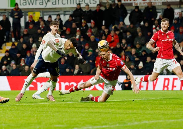 Wrexham, Wales, 9th January 2026. Dominic Hyam of Wrexham scores their third goal during the Wrexham vs Nottingham Forest FA Cup third round match at the SToK Cae Ras, Wrexham. Picture credit should read: Cody Froggatt Sportimage EDITORIAL USE ONLY. No use with unauthorised audio, video, data, fixture lists, club league logos or live services. Online in-match use limited to 120 images, no video emulation. No use in betting, games or single club league player publications. SPI_055_CF_Wrexham_Forest SPI-4440-0057