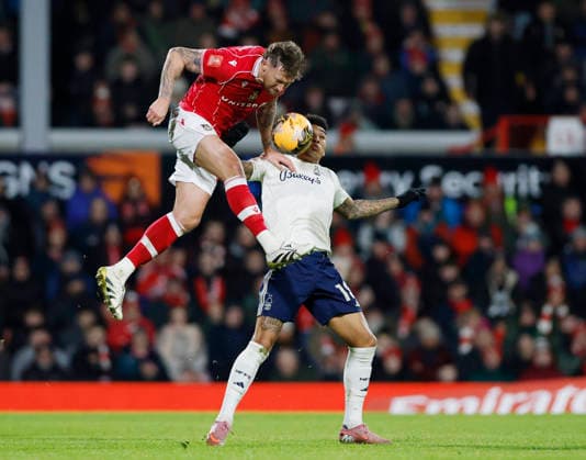Wrexham, Wales, 9th January 2026. Dan Scarr of Wrexham and Igor Jesus of Nottingham Forest during the Wrexham vs Nottingham Forest FA Cup third round match at the SToK Cae Ras, Wrexham. Picture credit should read: Cody Froggatt Sportimage EDITORIAL USE ONLY. No use with unauthorised audio, video, data, fixture lists, club league logos or live services. Online in-match use limited to 120 images, no video emulation. No use in betting, games or single club league player publications. SPI_051_CF_Wrexham_Forest SPI-4440-0063
