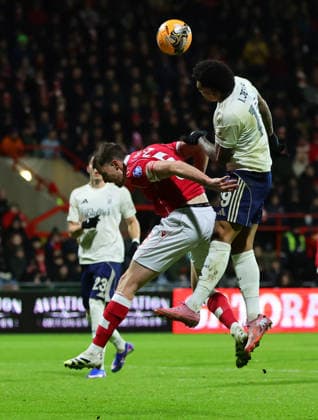 9th January 2026; Racecourse Ground, Wrexham, Wales; FA Cup Football, Wrexham versus Nottingham Forest; Igor Jesus of Nottingham Forest beats Dominic Hyam of Wrexham AFC in the air to the ball  RogerxEvans