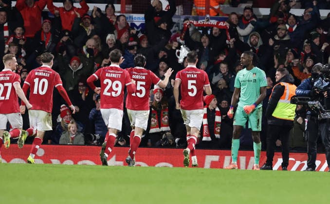 9th January 2026; Racecourse Ground, Wrexham, Wales; FA Cup Football, Wrexham versus Nottingham Forest; Arthur Okonkwo of Wrexham AFC after saving to send Wrexham through 7-6 after penalties is congratulated by team mates  RogerxEvans Content restricted for UK based newspaper