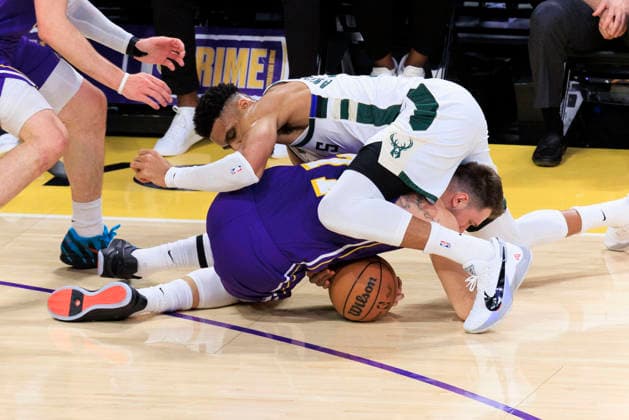 January 9, 2026, Los Angeles, California, USA: Luka Doncic 77 of the Los Angeles Lakers and Giannis Antetokounmpo 34 of the Milwaukee Bucks struggle for possession of the ball during their regular season NBA, Basketball Herren, USA game on Friday January 9, 2026 at Crypto.com Arena in Los Angeles, California. ARIANA RUIZ PI Los Angeles USA - ZUMAp124 20260109_zaa_p124_037 Copyright: xArianaxRuizx