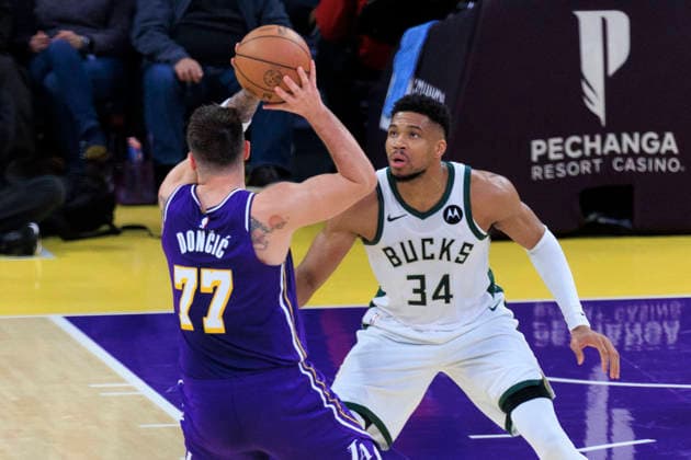 January 9, 2026, Los Angeles, California, USA: Luka Doncic 77 of the Los Angeles Lakers passes the ball as Giannis Antetokounmpo 34 of the Milwaukee Bucks defends during their regular season NBA, Basketball Herren, USA game on Friday January 9, 2026 at Crypto.com Arena in Los Angeles, California. ARIANA RUIZ PI Los Angeles USA - ZUMAp124 20260109_zaa_p124_098 Copyright: xArianaxRuizx