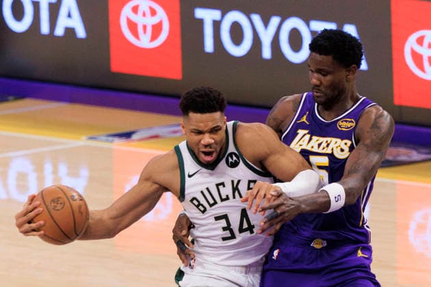 January 9, 2026, Los Angeles, California, USA: Deandre Ayton 5 of the Los Angeles Lakers attempts to block Giannis Antetokounmpo 34 of the Milwaukee Bucks during their regular season NBA, Basketball Herren, USA game on Friday January 9, 2026 at Crypto.com Arena in Los Angeles, California. ARIANA RUIZ PI Los Angeles USA - ZUMAp124 20260109_zaa_p124_101 Copyright: xArianaxRuizx