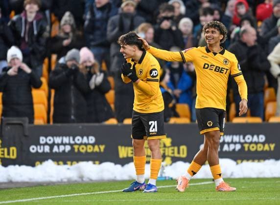 Rodrigo Gomes of Wolverhampton Wanderers celebrates scoring 5-1 with Pedro Lima Wolverhampton Wanderers v Shrewsbury Town, Emirates FA Cup, Third Round, Football, Molineux, Wolverhampton, UK - 10 Jan 2026Wolverhampton Molineux United Kingdom EDITORIAL USE ONLY No use with unauthorised audio, video, data, fixture lists, club league logos or live services. Online in-match use limited to 120 images, no video emulation. No use in betting, games or single club league player publications. Copyright: xAlanxWalter Shutterstockx 16246186ai