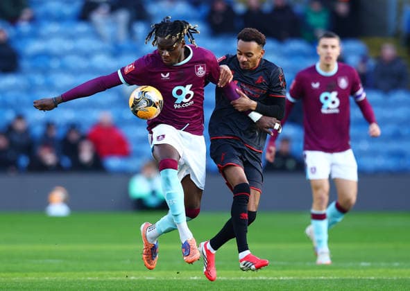 Lesley Ugochukwu of Burnley and Thierno Ballo of Millwall Burnley v Millwall, Emirates FA Cup, Third Round, Football, Turf Moor, Burnley, UK - 10 Jan 2026Burnley Turf Moor United Kingdom EDITORIAL USE ONLY No use with unauthorised audio, video, data, fixture lists, club league logos or live services. Online in-match use limited to 120 images, no video emulation. No use in betting, games or single club league player publications.  Copyright: xMattxWest Shutterstockx 16246250u