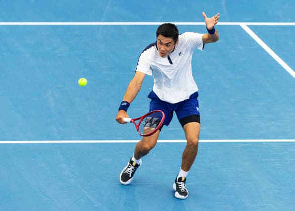 January 10, 2026, Brisbane, Qld, Australia: BRANDON NAKASHIMA of the United States plays a backhand volley during his MenÃ¢â‚¬â ¢s Singles semifinal match against ALEKSANDAR KOVACEVIC of the United States at the Brisbane International. Brisbane Australia - ZUMAt173 20260110_zsp_t173_019 Copyright: xStephanexThomasx