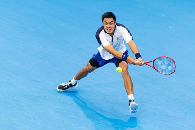 January 10, 2026, Brisbane, Qld, Australia: BRANDON NAKASHIMA of the United States reaches for the ball during his MenÃ¢â‚¬â ¢s Singles semifinal match against ALEKSANDAR KOVACEVIC of the United States at the Brisbane International. Brisbane Australia - ZUMAt173 20260110_zsp_t173_021 Copyright: xStephanexThomasx