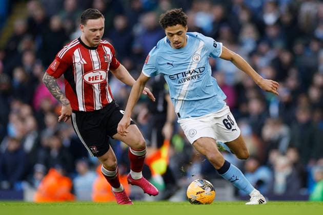 Max Alleyne of Manchester City is pressured by Jayden Wareham of Exeter City Manchester City v Exeter City, Emirates FA Cup, Third Round, Football, Etihad Stadium, Manchester, UK - 10 Jan 2026Manchester Etihad Stadium United Kingdom EDITORIAL USE ONLY No use with unauthorised audio, video, data, fixture lists, club league logos or live services. Online in-match use limited to 120 images, no video emulation. No use in betting, games or single club league player publications. Copyright: xWillxCooper Shutterstockx 16246255l