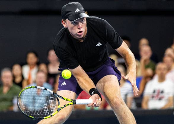 January 10, 2026, Brisbane, Qld, Australia: ALEX MICHELSEN of the United States plays a low forehand volley during his MenÃ¢â‚¬â ¢s Singles semifinal match against DANIIL MEDVEDEV of Russia at the Brisbane International. Brisbane Australia - ZUMAt173 20260110_zsp_t173_046 Copyright: xStephanexThomasx