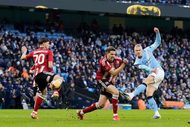 Manchester, England, 10th January 2026. Erling Haaland of Manchester City takes shot which goes wide during the Manchester City vs Exeter City FA Cup match at the Etihad Stadium, Manchester. Picture credit should read: Andrew Yates Sportimage EDITORIAL USE ONLY. No use with unauthorised audio, video, data, fixture lists, club league logos or live services. Online in-match use limited to 120 images, no video emulation. No use in betting, games or single club league player publications. SPI_016_AY_Man_City_Exeter SPI-4442-0015