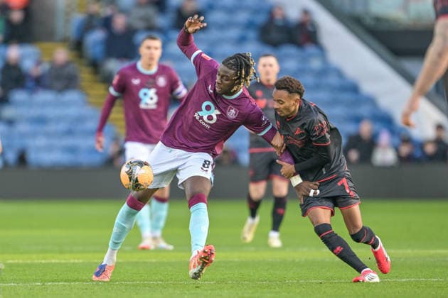 10th January 2026; Turf Moor, Burnley, Lancashire, England; FA Cup Football, Burnley versus Millwall; Thierno Ballo of Millwall tussles with Lesley Ugochukwu of Burnley for the ball  LeexDurkin