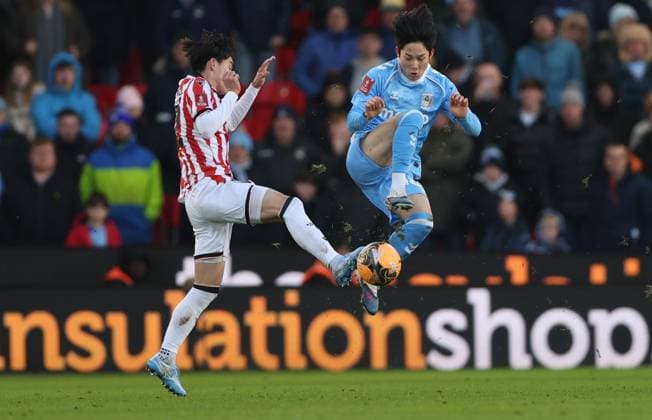 Yang Min-hyeok of Coventry City is fouled by Tatsuki Seko of Stoke City Stoke City v Coventry City, Emirates FA Cup, Third Round, Football, Bet365 Stadium, Stoke-on-Trent, UK - 10 Jan 2026Stoke-on-Trent Bet365 Stadium United Kingdom EDITORIAL USE ONLY No use with unauthorised audio, video, data, fixture lists, club league logos or live services. Online in-match use limited to 120 images, no video emulation. No use in betting, games or single club league player publications.  Copyright: xKieranxMcManus Shutterstockx 16246248cc