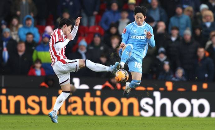 Yang Min-hyeok of Coventry City is fouled by Tatsuki Seko of Stoke City Stoke City v Coventry City, Emirates FA Cup, Third Round, Football, Bet365 Stadium, Stoke-on-Trent, UK - 10 Jan 2026Stoke-on-Trent Bet365 Stadium United Kingdom EDITORIAL USE ONLY No use with unauthorised audio, video, data, fixture lists, club league logos or live services. Online in-match use limited to 120 images, no video emulation. No use in betting, games or single club league player publications.  Copyright: xKieranxMcManus Shutterstockx 16246248cd