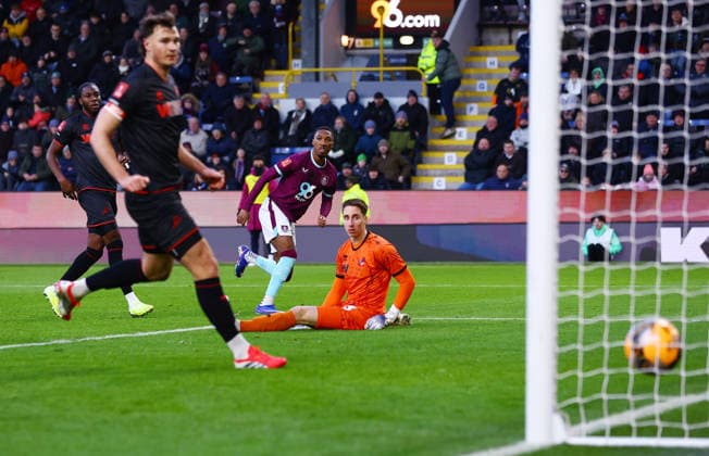 Jaidon Anthony of Burnley scores a goal to make it 3-0 past Millwall goalkeeper Steven Benda Burnley v Millwall, Emirates FA Cup, Third Round, Football, Turf Moor, Burnley, UK - 10 Jan 2026Burnley Turf Moor United Kingdom EDITORIAL USE ONLY No use with unauthorised audio, video, data, fixture lists, club league logos or live services. Online in-match use limited to 120 images, no video emulation. No use in betting, games or single club league player publications.  Copyright: xMattxWest Shutterstockx 16246250aj