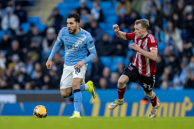 10th January 2026; Etihad Stadium, Manchester, Lancashire, England; FA Cup Football, Manchester City versus Exeter City; Rayan Cherki of Manchester City under pressure from Jake Doyle-Hayes of Exeter City  TimxWilliams