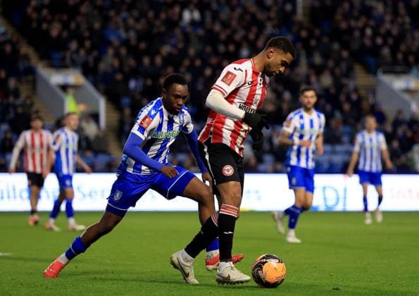 Reiss Nelson of Brentford in action against Sean Fusire of Sheffield Wednesday Sheffield Wednesday v Brentford, Emirates FA Cup, Third Round, Football, Hillsborough, Sheffield, UK - 10 Jan 2026Sheffield Hillsborough United Kingdom EDITORIAL USE ONLY No use with unauthorised audio, video, data, fixture lists, club league logos or live services. Online in-match use limited to 120 images, no video emulation. No use in betting, games or single club league player publications. Copyright: xGeorgexTewkesbury Shutterstockx 16246263bs