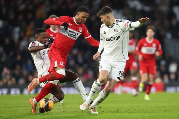 10th January 2026; Craven Cottage, Fulham, London, England; FA Cup Football, Fulham versus Middlesbrough; Morgan Whittaker of Middlesbrough under challenge from Ryan Sessegnon and Jorge Cuenca of Fulham  KatiexChan