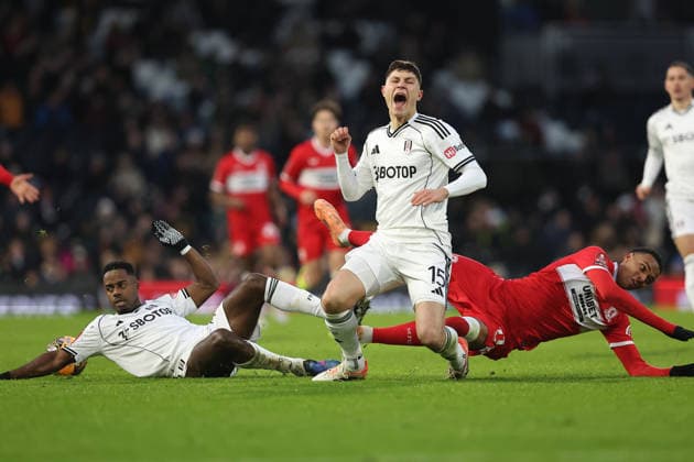 10th January 2026; Craven Cottage, Fulham, London, England; FA Cup Football, Fulham versus Middlesbrough; Morgan Whittaker of Middlesbrough under challenge from Ryan Sessegnon and Jorge Cuenca of Fulham  KatiexChan