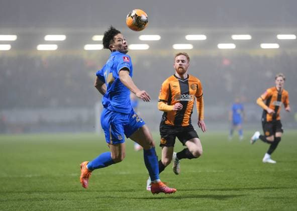 Tomoki Iwata of Birmingham City gets the ball ahead of James Brophy of Cambridge United Cambridge United v Birmingham City, Emirates FA Cup, Third Round, Football, Cledara Abbey Stadium, Cambridge, UK - 10 Jan 2026Cambridge Cledara Abbey Stadium United Kingdom EDITORIAL USE ONLY No use with unauthorised audio, video, data, fixture lists, club league logos or live services. Online in-match use limited to 120 images, no video emulation. No use in betting, games or single club league player publications.  Copyright: xJedxLeicester Shutterstockx 16246307n
