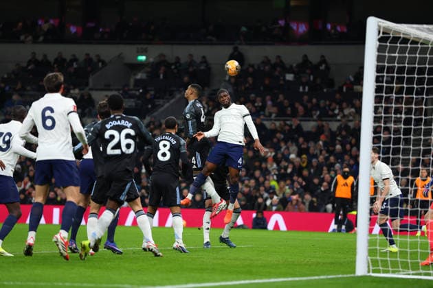 10th January 2026; Tottenham Hotspur Stadium, London, England; FA Cup Football, Tottenham Hotspur versus Aston Villa; Kevin Danso of Tottenham Hotspur heads the ball over Ezri Konsa of Aston Villa from a Tottenham Hotspur cross  JohnxPatrickxFletcher