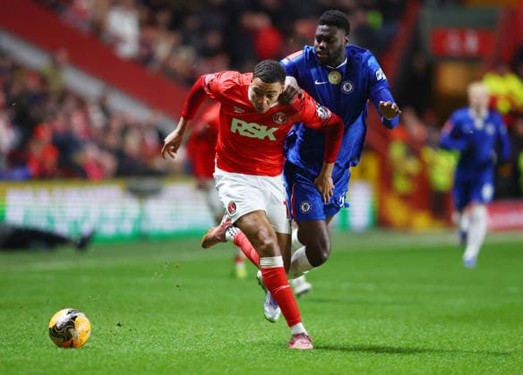 London, England, 10th January 2026. Miles Leaburn of Cahrlton Athletic tussles with Benoit Badiashile of Chelsea during the Charlton Athletic vs Chelsea FA Cup match at The Valley, London. Picture credit should read: Paul Terry Sportimage EDITORIAL USE ONLY. No use with unauthorised audio, video, data, fixture lists, club league logos or live services. Online in-match use limited to 120 images, no video emulation. No use in betting, games or single club league player publications. SPI_024_PT_Charlton_Chelsea SPI-4443-0024