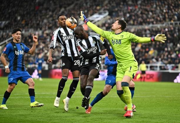 Yoane Wisse of Newcastle United vies for the ball with Djordje Petrovic of Bournemouth Newcastle United v AFC Bournemouth, Emirates FA Cup, Third Round, Football, St James Park, Newcastle, UK - 10 Jan 2026Newcastle St James Park United Kingdom EDITORIAL USE ONLY No use with unauthorised audio, video, data, fixture lists, club league logos or live services. Online in-match use limited to 120 images, no video emulation. No use in betting, games or single club league player publications. Copyright: xRichardxLee Shutterstockx 16246259eh