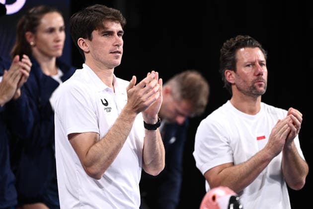 TENNIS UNITED CUP SYDNEY, Team Poland captain Mateusz Terczynski (left) watches on during the women™s singles final between Iga Swiatek of Poland and Belinda Bencic of Switzerland in the 2026 United Cup final between Poland and Switzerland at Ken Rosewall Arena in Sydney, Sunday, January 11, 2026. ( NO ARCHIVING, EDITORIAL USE ONLY SYDNEY NEW SOUTH WALES AUSTRALIA  Copyright: xDANxHIMBRECHTSx 20260111161213293613