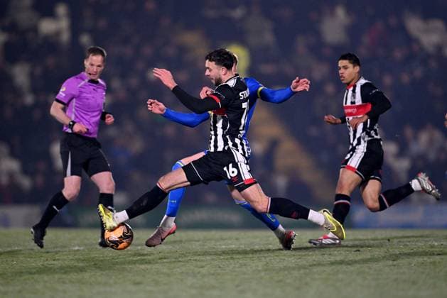 Reece Staunton of Grimsby Town and Ollie Dewsbury of Weston-super-Mare Grimsby Town v Weston Super Mare, Emirates FA Cup, Third Round, Football, Blundell Park, Grimsby, UK - 10 Jan 2026Grimsby Blundell Park United Kingdom EDITORIAL USE ONLY No use with unauthorised audio, video, data, fixture lists, club league logos or live services. Online in-match use limited to 120 images, no video emulation. No use in betting, games or single club league player publications. Copyright: xAnnaxGowthorpe Shutterstockx 16246310az
