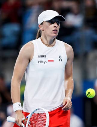 (260111) -- SYDNEY, Jan. 11, 2026 -- Iga Swiatek of Team Poland reacts during the women s singles match against Belinda Bencic of Team Switzerland at the 2026 United Cup tennis tournament final in Sydney, Australia, Jan. 11, 2026. ) (SP)AUSTRALIA-SYDNEY-TENNIS-UNITED CUP-FINAL-POL VS SUI MaxPing 