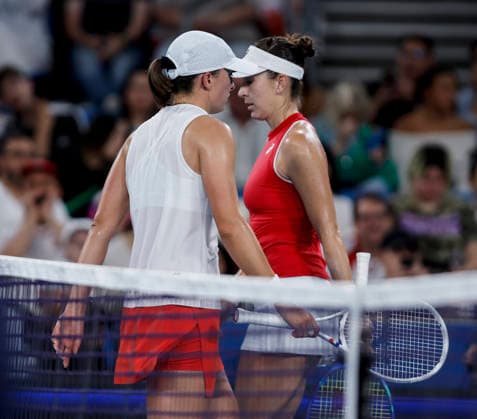 (260111) -- SYDNEY, Jan. 11, 2026 -- Iga Swiatek (L) of Team Poland and Belinda Bencic of Team Switzerland react during their women s singles match at the 2026 United Cup tennis tournament final in Sydney, Australia, Jan. 11, 2026. ) (SP)AUSTRALIA-SYDNEY-TENNIS-UNITED CUP-FINAL-POL VS SUI MaxPing 