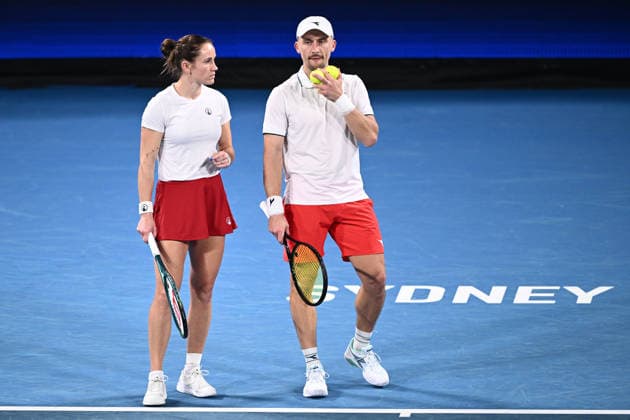 TENNIS UNITED CUP SYDNEY, Katarzyna Kawa and Jan Zielinski of Poland in action during their mixed doubles final match against Belinda Bencic and Jakub Paul of Switzerland in the 2026 United Cup final between Poland and Switzerland at Ken Rosewall Arena in Sydney, Sunday, January 11, 2026. ( NO ARCHIVING, EDITORIAL USE ONLY SYDNEY NEW SOUTH WALES AUSTRALIA  Copyright: xDANxHIMBRECHTSx 20260111134541063144