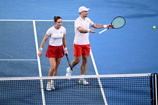 TENNIS UNITED CUP SYDNEY, Katarzyna Kawa and Jan Zielinski of Poland in action during their mixed doubles final match against Belinda Bencic and Jakub Paul of Switzerland in the 2026 United Cup final between Poland and Switzerland at Ken Rosewall Arena in Sydney, Sunday, January 11, 2026. ( NO ARCHIVING, EDITORIAL USE ONLY SYDNEY NEW SOUTH WALES AUSTRALIA  Copyright: xDANxHIMBRECHTSx 20260111162765051354