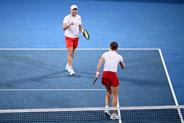 TENNIS UNITED CUP SYDNEY, Katarzyna Kawa (right) and Jan Zielinski of Poland in action during their mixed doubles final match against Belinda Bencic and Jakub Paul of Switzerland in the 2026 United Cup final between Poland and Switzerland at Ken Rosewall Arena in Sydney, Sunday, January 11, 2026. ( NO ARCHIVING, EDITORIAL USE ONLY SYDNEY NEW SOUTH WALES AUSTRALIA  Copyright: xDANxHIMBRECHTSx 20260111194108325280