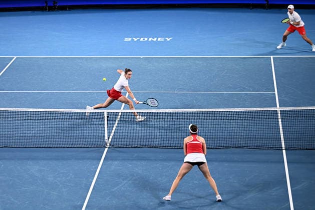 TENNIS UNITED CUP SYDNEY, Katarzyna Kawa and Jan Zielinski of Poland (top) in action during their mixed doubles final match against Belinda Bencic and Jakub Paul of Switzerland in the 2026 United Cup final between Poland and Switzerland at Ken Rosewall Arena in Sydney, Sunday, January 11, 2026. ( NO ARCHIVING, EDITORIAL USE ONLY SYDNEY NEW SOUTH WALES AUSTRALIA  Copyright: xDANxHIMBRECHTSx 20260111132249462251