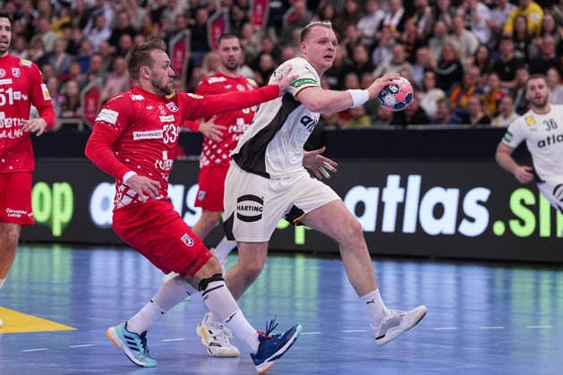 11 01 2026, xydrx, Handball, Mens international match, Germany Croatia, ZAG Arena Luka Cindric CRO 33 in duel against Justus Fischer GER 54 Lower Saxony Germany