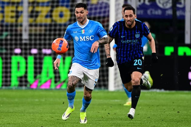 Inter Milan v Napoli - Italian Serie A MILAN, ITALY - JANUARY 11: Matteo Politano of SSC Napoli fights for the ball with Hakan Calhanoglu of Inter Milan during the Italian Serie A football match Inter Milan vs Napoli at San Siro Stadium in Milan, Italy on January 11, 2026 Piero Cruciatti Anadolu Milan Italy. Editorial use only. Please get in touch for any other usage.  Copyright: x2026xAnadoluxPieroxCruciattix