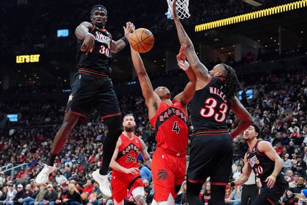 January 11, 2026, Toronto, On, CANADA: Toronto Raptors forward guard Scottie Barnes (4) gets fouled on his way to the hoop by Philadelphia 76ers forward Jabari Walker (33) as teammate Adem Bona (30) looks on during first half NBA, Basketball Herren, USA basketball action in Toronto, Sunday, Jan. 11, 2026. Canada News - January 11, 2026 - ZUMAc35_ 20260111_zaf_c35_091 Copyright: xFrankxGunnx