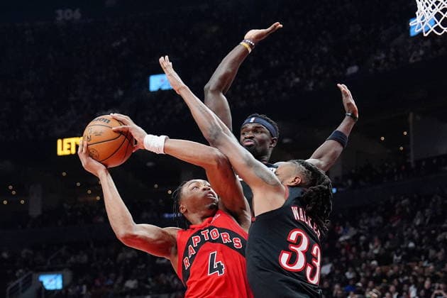 January 11, 2026, Toronto, On, CANADA: Toronto Raptors forward guard Scottie Barnes (4) gets fouled on his way to the hoop by Philadelphia 76ers forward Jabari Walker (33) as teammate Adem Bona (30) looks on during first half NBA, Basketball Herren, USA basketball action in Toronto, Sunday, Jan. 11, 2026. Canada News - January 11, 2026 - ZUMAc35_ 20260111_zaf_c35_123 Copyright: xFrankxGunnx