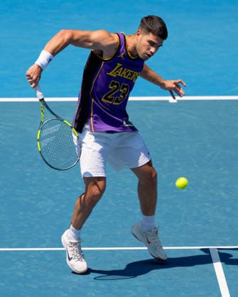 January 12, 2026: CARLOS ALCARAZ of Spain practises on Rod Laver Arena ahead of the 2026 Australian Open in Melbourne, Australia. Cal Media Melbourne Australia - ZUMAc04_ 20260112_faf_c04_005 Copyright: xSydneyxLowx