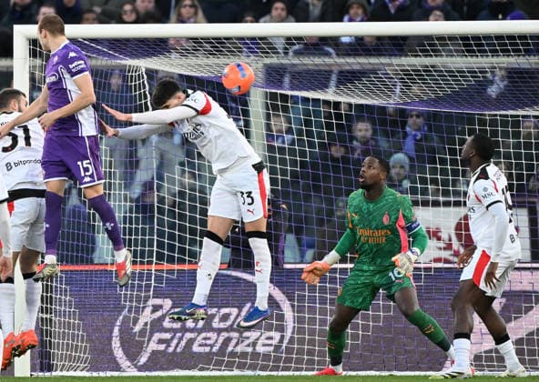 (260112) -- FLORENCE, Jan. 12, 2026 -- Fiorentina s Pietro Comuzzo (2nd L) scores during a Serie A football match between Fiorentina and AC Milan in Florence, Italy, Jan. 11, 2026. (Photo by Xinhua) (SP)ITALY-FLORENCE-FOOTBALL-SERIE A- FIORENTINA VS AC MILAN AlbertoxLingria 