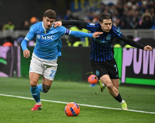 (260112) -- MILAN, Jan. 12, 2026 -- Inter Milan s Piotr Zielinski (R) vies with Napoli s Giovanni Di Lorenzo during a Serie A football match between Inter Milan and Napoli in Milan, Italy, Jan. 11, 2026. (Photo by Xinhua) (SP)ITALY-MILAN-FOOTBALL-SERIE A-INTER MILAN VS NAPOLI AlbertoxLingria 